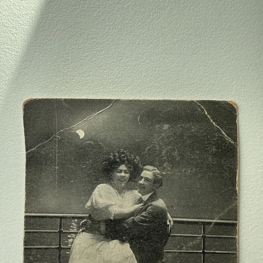 1912 Romance Postcard-Man Holding a Lady on His Lap on a Moonlight Ship's Deck